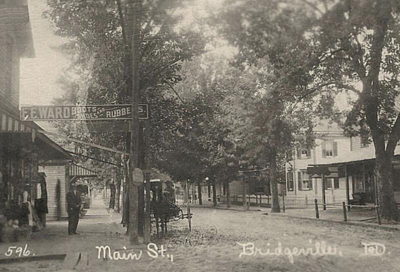 The first streets in Sussex downtowns were unpaved dirt, such as Main Street in Bridgeville during horse-and-buggy days. DELAWARE PUBLIC ARCHIVES PHOTO